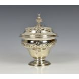 A late George II silver lidded sucrier, William Shaw and William Priest, London 1759, the urn shaped