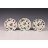 Three Chinese famille rose porcelain saucers, 19th century or earlier, of circular form with