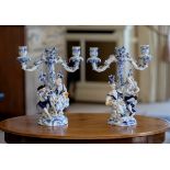 A pair of Sitzendorf blue and white porcelain twin branch candelabra, late 19th century, with blue