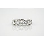 A platinum and diamond 5 stone ring, the diamonds are well matched and total approximately 2.56ct.