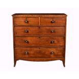 An early 19th century mahogany straight front chest, with two short over three long graduated