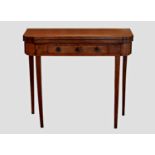 A late Regency rosewood and mahogany card table, probably Continental, the D-shaped foldover top