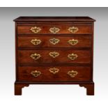 A George III mahogany bachelor's chest, the thumb moulded top over a brushing slide and four long