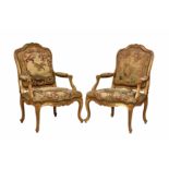 A pair of 18th century Italian giltwood fauteuils, possibly Turinese, the squared cartouche backs