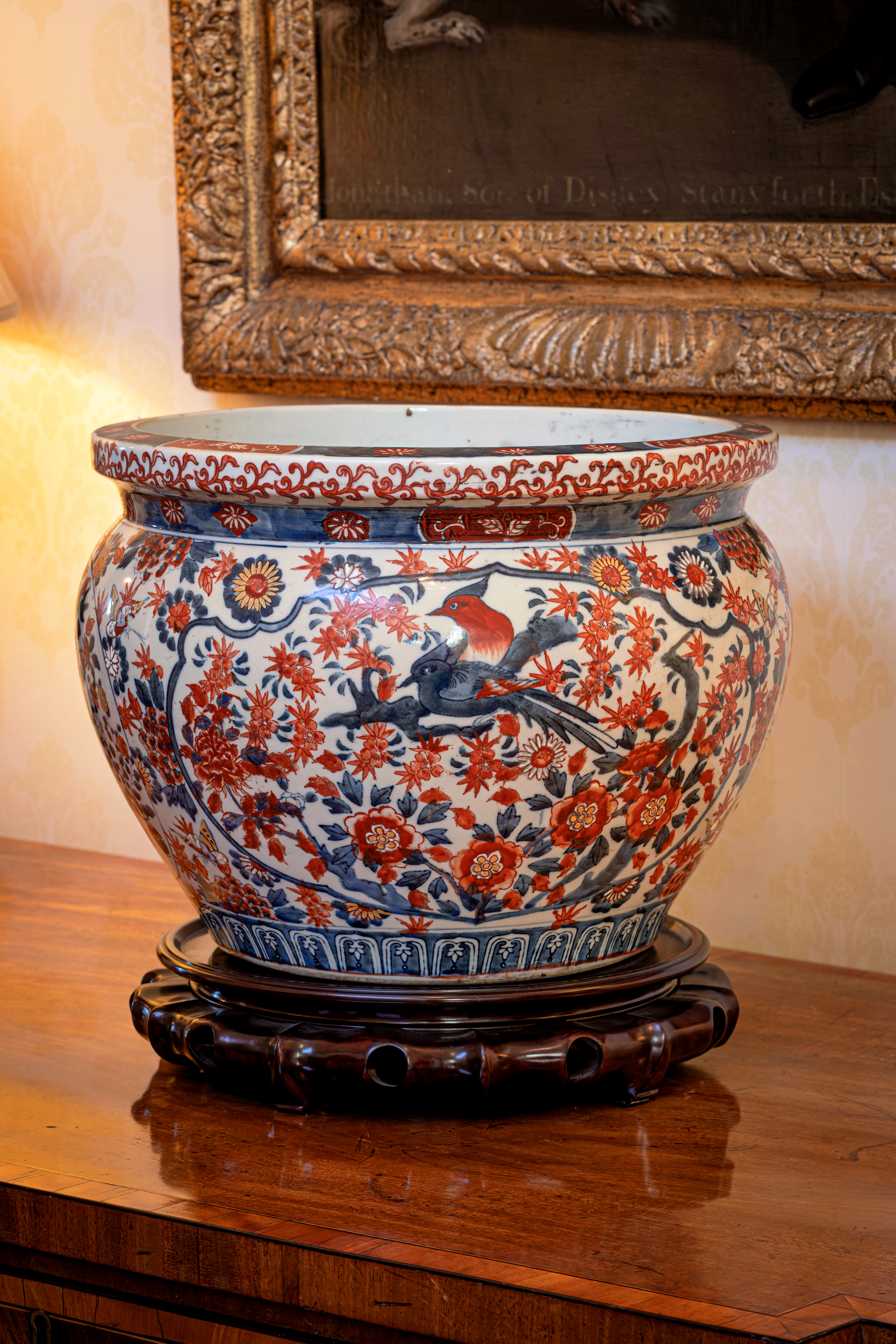 A Japanese porcelain Imari jardinière, early 20th century, decorated in the typical palette with two