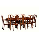 A burr walnut early Georgian style extending dining table and chairs, late 20th century, by Ian