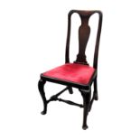 A George II mahogany side chair, the slightly serpentine back with solid vase splat, over a drop-