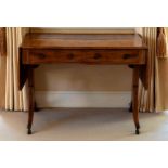 A George III mahogany sofa table, the rectangular dropflap top with rounded angles and tulipwood