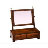 An early 19th century box base walnut toilet mirror, the rectangular plate within a half-round
