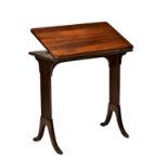 A Georgian style mahogany reading table, 20th century, the rectangular top with book rest and rising