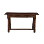 A 17th century style oak single drawer side table in the style of Titchmarsh and Goodwin, the