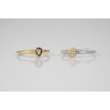 An 18ct yellow gold and clear stone ring together with a silver and diamond ring (2), the clear