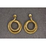 A pair of 18ct yellow gold loop spiral earrings - gross weight 12g.
