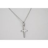 A 9ct white gold cross pendant and chain, the pendant measuring 18mm and suspended on a fine,