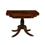 A George IV rosewood card table, well figured fold over top with green baize, over a panelled frieze