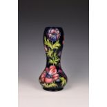 A Moorcroft vase, post-war, of double gourd form, tubeline decorated with the anenome pattern on a