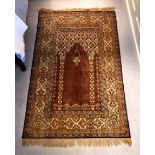 A Persian synthetic silk prayer rug, modern, the mihrab with hanging lantern and floral columns,