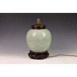 A Chinese celadon and white slip decorated porcelain ginger jar, converted to a lamp, probably