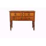 A 19th-century honey oak dressing table, the plain top over an arrangement of six drawers with later