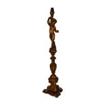 An Italian carved wooden figural standard lamp, in the 18th century style, 20th century, with a