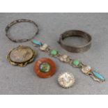 A small group of Victorian and early 20th century silver and costume jewellery, featuring two