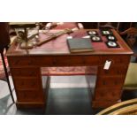 A Victorian mahogany double pedestal desk, the rectangular top with red leather (a/f) and three