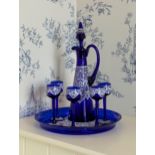 A Venetian blue glass and enamel decanter set, probably first half 20th century, comprising a
