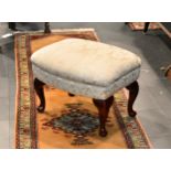 A Victorian style footstool, late 20th century, tonneau shaped, the stuff over seat in silk damask,