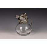 A novelty Continental silver plate glass carafe mounted with a wild boar's head, 1960s, the clear