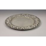 An Italian 800 silver salver by S A Calderoni Milano, of circular form, the rim repoussé decorated