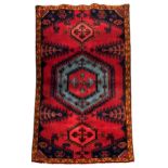 A Viss rug, North West Persia, second half 20th century, the central light blue and red medallion