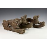 Two Victorian wooden Black Forest carved dog table legs or supports, 17¼in. (44cm.) long, together