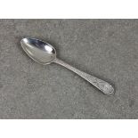 A Channel Islands silver bright cut Old English pattern teaspoon, maker's mark IP, struck once (