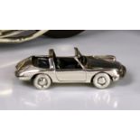 An Italian sterling silver model of a Porsche, marked to underside with a star - 175 - AR (