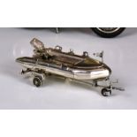 An Italian sterling silver model of a dinghy / rib and trailer by Sacchetti, the well detailed model