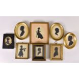 Six portrait silhouettes, 19th, early 20th century, including two of gentleman wearing broad
