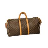 A Louis Vuitton style holdall, believed to be a copy, in monogram canvas with faux-suede cloth