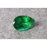 A 2.25ct Zambian pear cut emerald, the emerald a medium-dark toned blueish green and accompanied