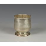 A George VI silver beaker, A Wilcox, Birmingham, 1946, having rolled rim and stepped spreading foot,