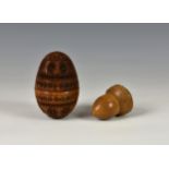 Sewing interest - A 19th century coquilla nut sewing egg, having screw attachment, opening to reveal