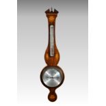 An Edwardian fiddleback mahogany and marquetry Regency style wheel barometer, by Warren of