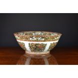 A Chinese porcelain famille verte punch bowl, first half 20th century, painted to the interior and