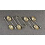 A set of six George V silver Apostle coffee spoons / teaspoons and tongs, William Devenport,