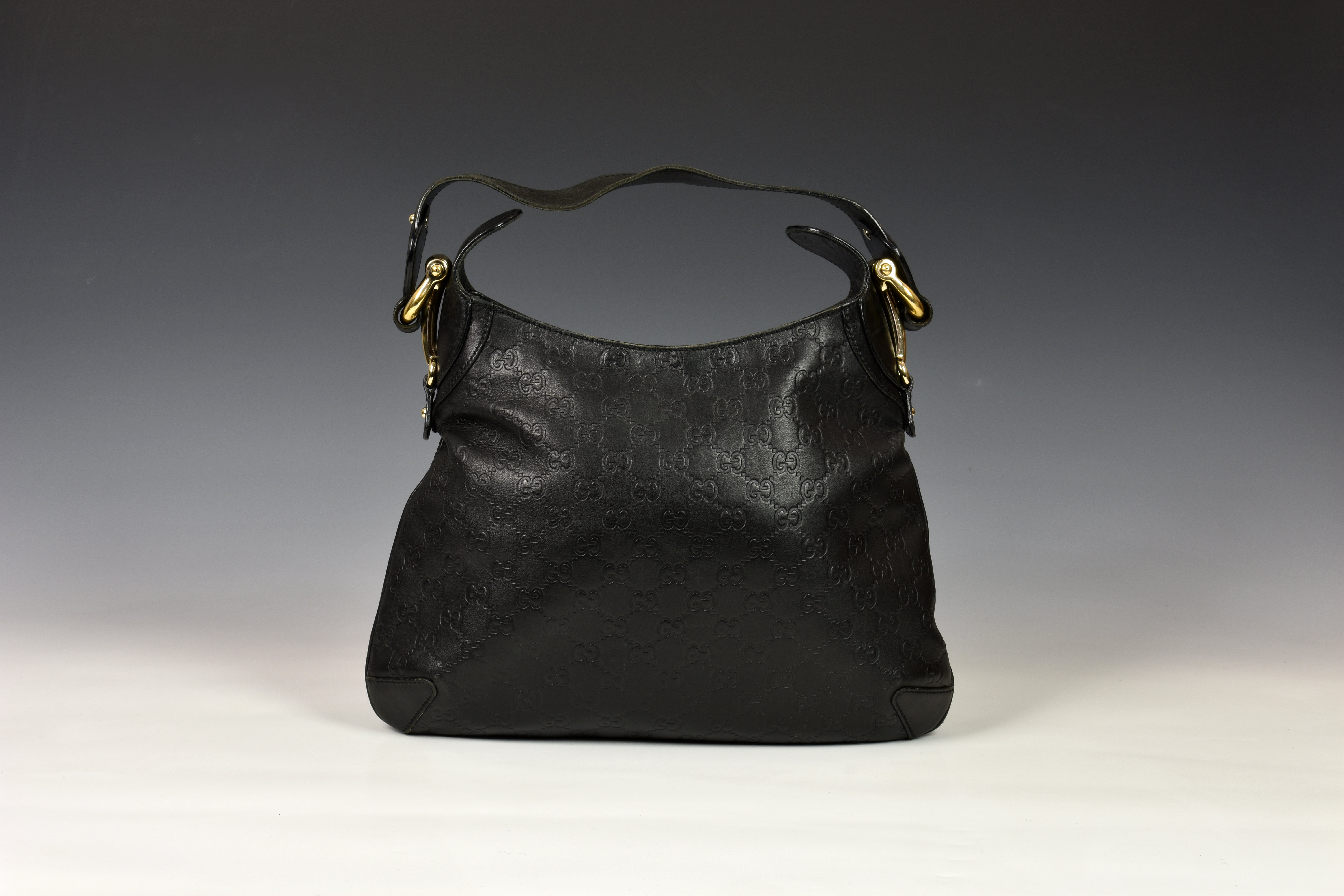 A Gucci Guccissima Creole Hobo black leather monogram handbag, model 145826, with embossed black - Image 2 of 2