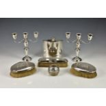 A small collection of silver smalls, to include a pair of vintage weighted table candelabra by A. L.