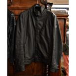 A gents Belstaff black wax cotton motorcycle style jacket, with water repellent cotton exterior,