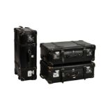 A set of three vintage Globetrotter suitcases, black leather with chrome fittings and two leather