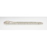 An 18ct white gold and diamond tennis bracelet, the round cut diamonds totalling approximately 2.