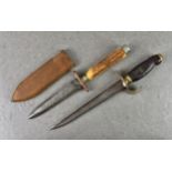 Two WWI or later trench / fighting knives, horn handle fighting knife, copper guard, metal