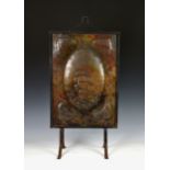 An Arts and Crafts copper fire screen, the central panel depicting a galleon in full sale, overall